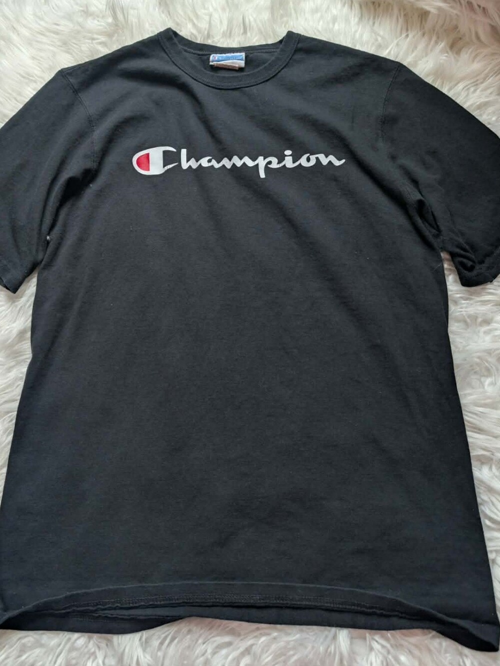 Champion Black T‑Shirt with White Logo and Red Accent